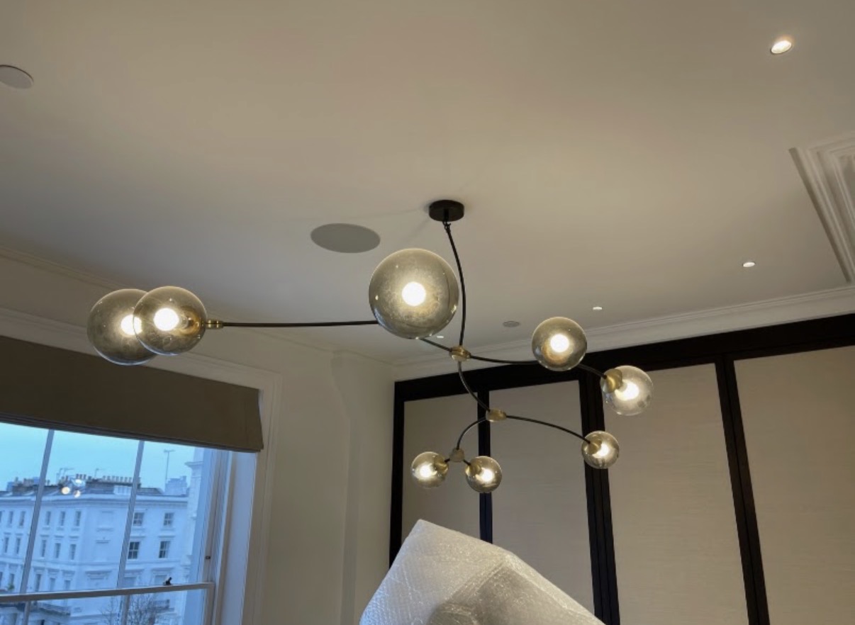 Contemporary multi-globe ceiling light installation