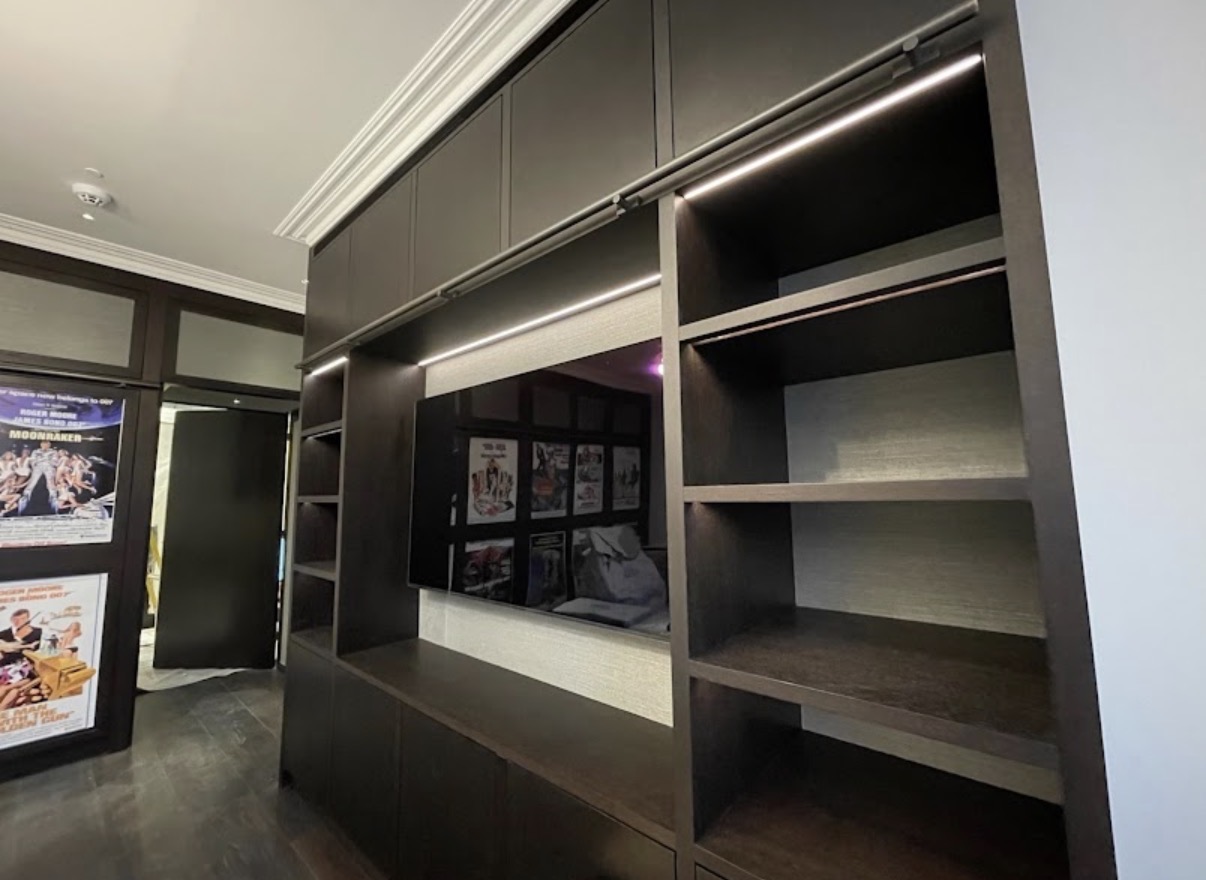 Media wall with integrated LED strip lighting